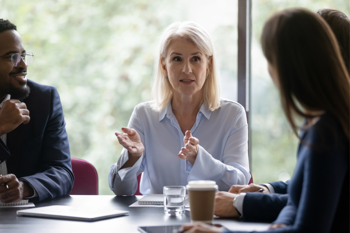 Elevate Employee Performance Through Post-Assessment Coaching. Female professional coaches group of employees