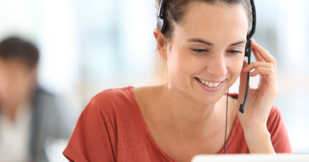 Essential Guide to Mystery Shopping - smiling woman on phone headset