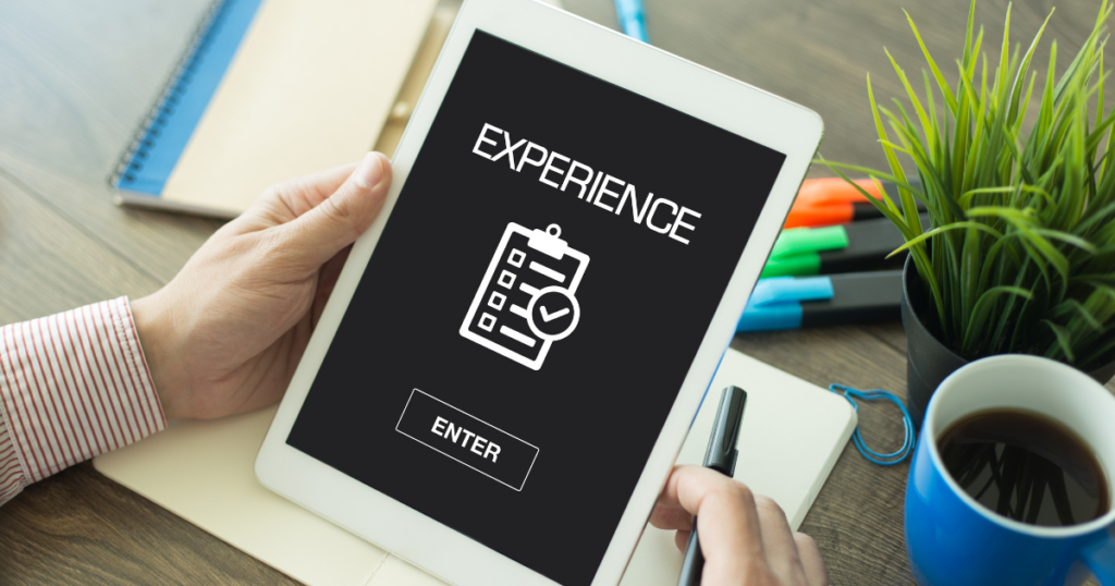 Customer Experience Management for Any Budget - person holding a tablet with customer experience survey loaded