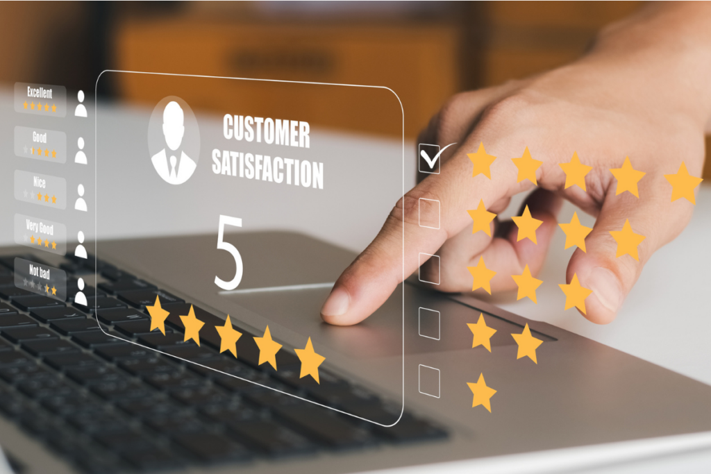 a person's fingers touch a laptop keyboard while a graphic overlay reads "customer satisfaction" and a 5 star selection.